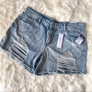 Rue21 juniors blue denim shorts, mid rise. Distressed and ripped, size 16